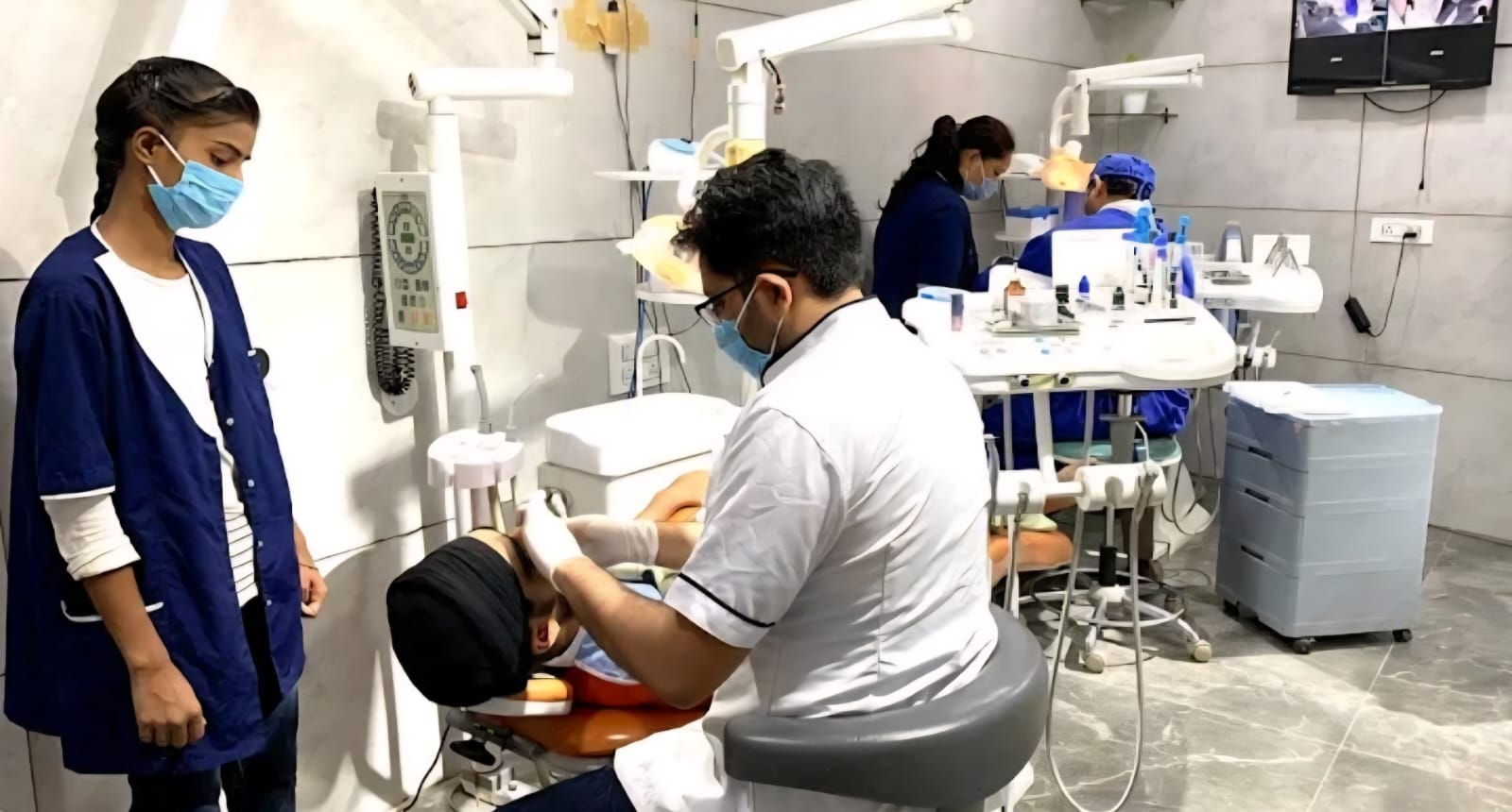 Dr. Aniket Gupta and team caring for a patient